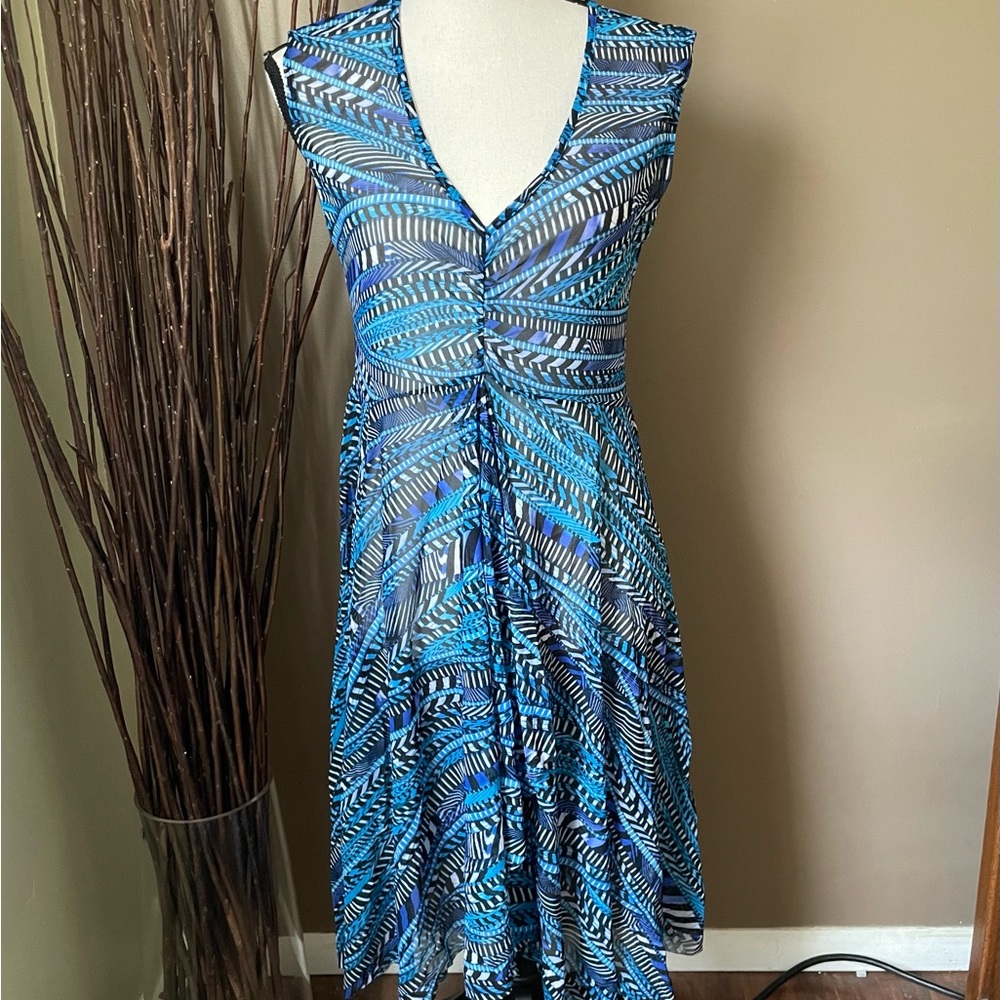Blue Patterned Sleeveless high low beach coverup with front slit.